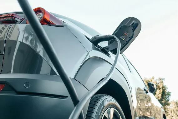 Electric vehicle plugged in